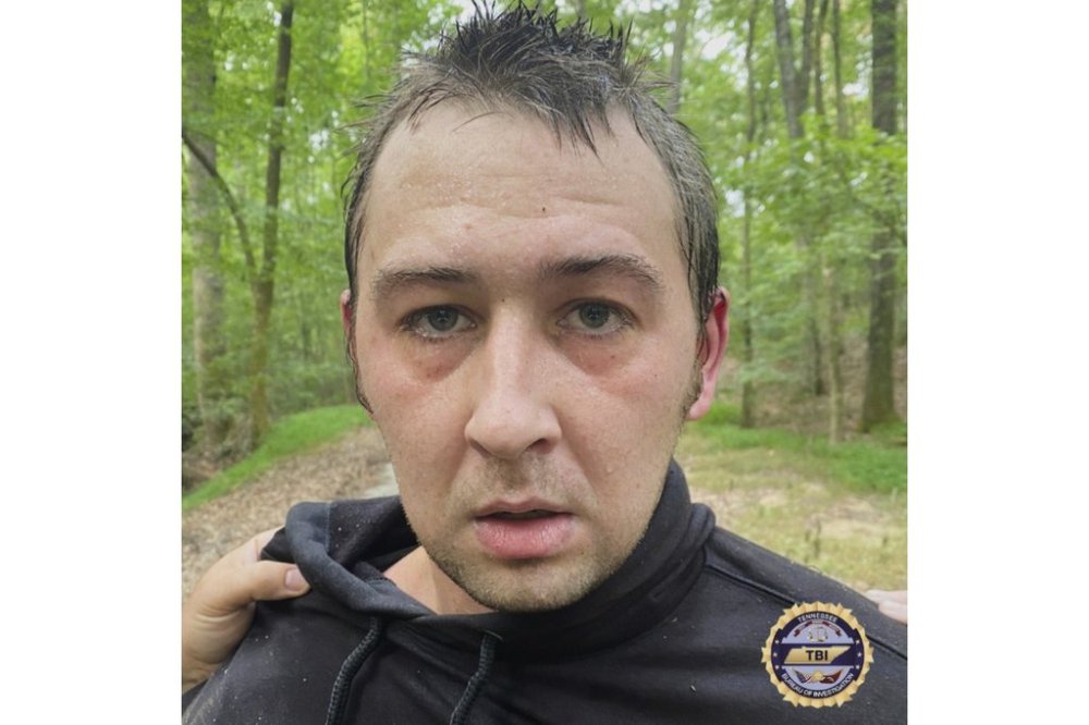 This photo provided by Tennessee Bureau of Investigation on Tuesday, Aug. 5, 2025 shows Austin Drummond, moments after having been taken into custody. (Tennessee Bureau of Investigation via AP)
