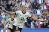 Germany's Lea Schueller celebrates after scoring her side's second goal during the Euro 2025, group C, soccer match between Germany and Denmark at St. Jakob-Park in Basel, Switzerland, Tuesday, July 8, 2025. (AP Photo/Martin Meissner)