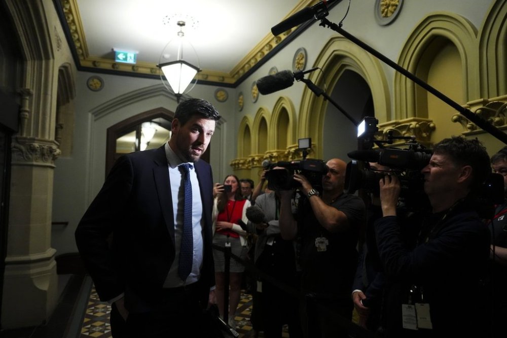 Minister of Justice Sean Fraser makes his way to a meeting on Parliament Hill in Ottawa on Friday, June 13, 2025. THE CANADIAN PRESS/Sean Kilpatrick