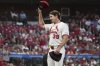 St. Louis Cardinals starting pitcher Miles Mikolas tips his cap to fans as he leaves a baseball game against the Washington Nationals during the sixth inning Thursday, July 10, 2025, in St. Louis. (AP Photo/Jeff Roberson)