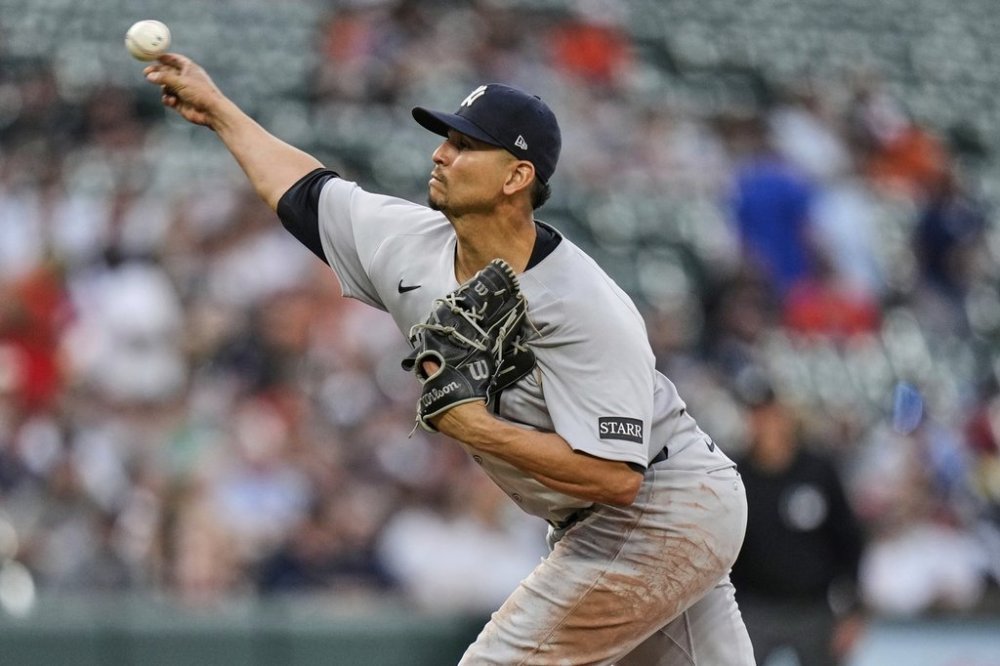 FILE - New York Yankees starting pitcher Carlos Carrasco pitches during the third inning of a baseball game against the Baltimore Orioles on April 30, 2025, in Baltimore. (AP Photo/Stephanie Scarbrough, File)