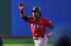 Cleveland Guardians' Jose Ramirez gestures as he runs the bases with a home run in the first inning of a baseball game against the Baltimore Orioles in Cleveland, Monday, July 21, 2025. (AP Photo/Sue Ogrocki)