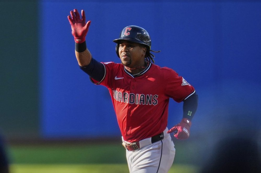 Cleveland Guardians' Jose Ramirez gestures as he runs the bases with a home run in the first inning of a baseball game against the Baltimore Orioles in Cleveland, Monday, July 21, 2025. (AP Photo/Sue Ogrocki)