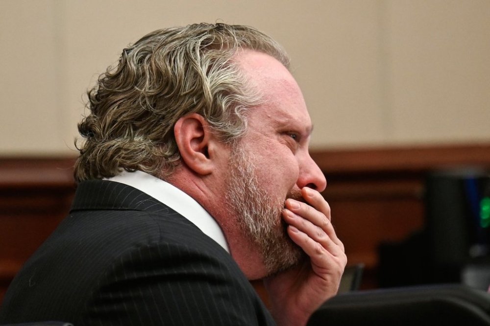 James Craig wipes his face during opening arguments in his murder trial, as he is accused of killing his wife, at the Arapahoe District Court, Tuesday, July 15, 2025, in Centennial, Colo. (Stephen Swofford via Denver Gazette, Pool)