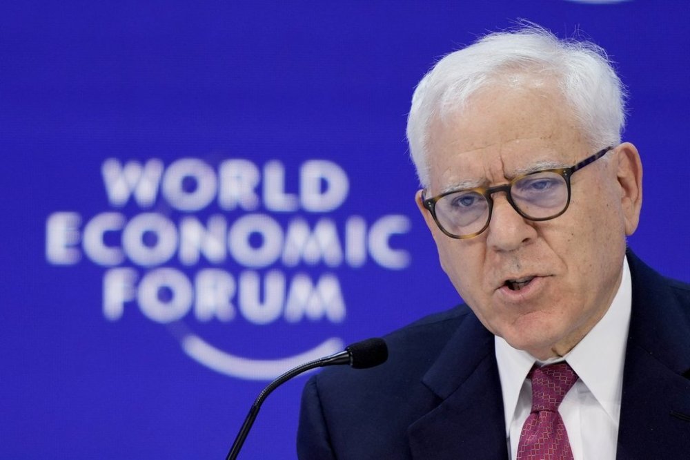 Co-founder and co-chairman of the private equity firm The Carlyle Group David Rubenstein speaks in the panel