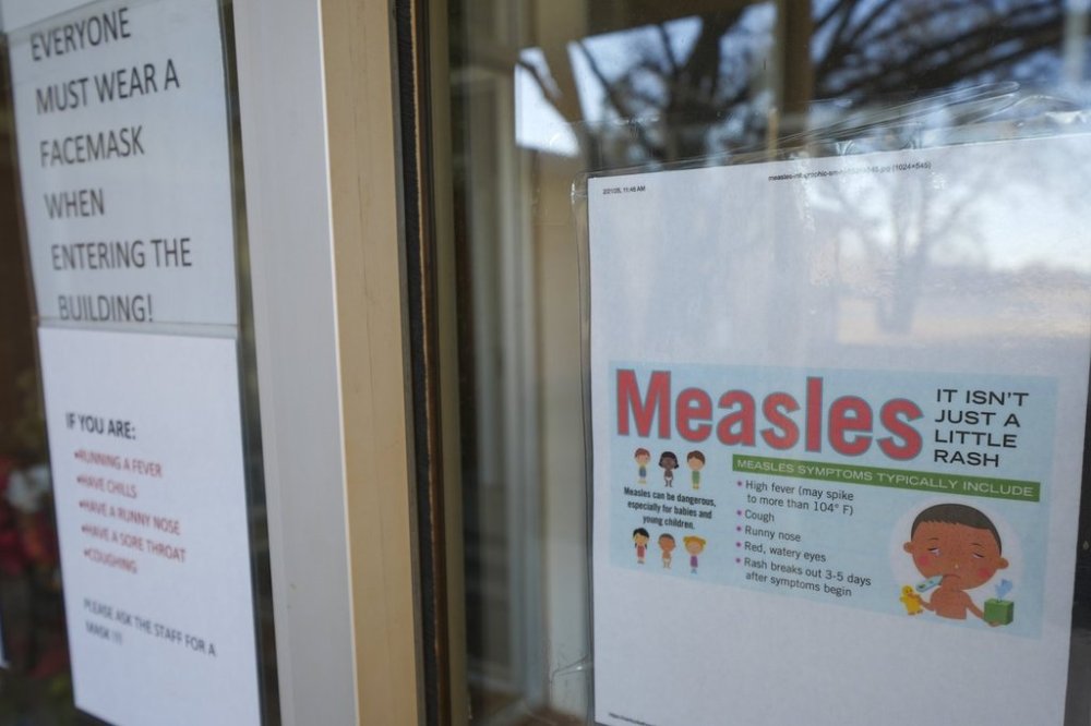 FILE - A sign is seen outside a clinic with the South Plains Public Health District, Feb. 23, 2025, in Brownfield, Texas. (AP Photo/Julio Cortez, File)