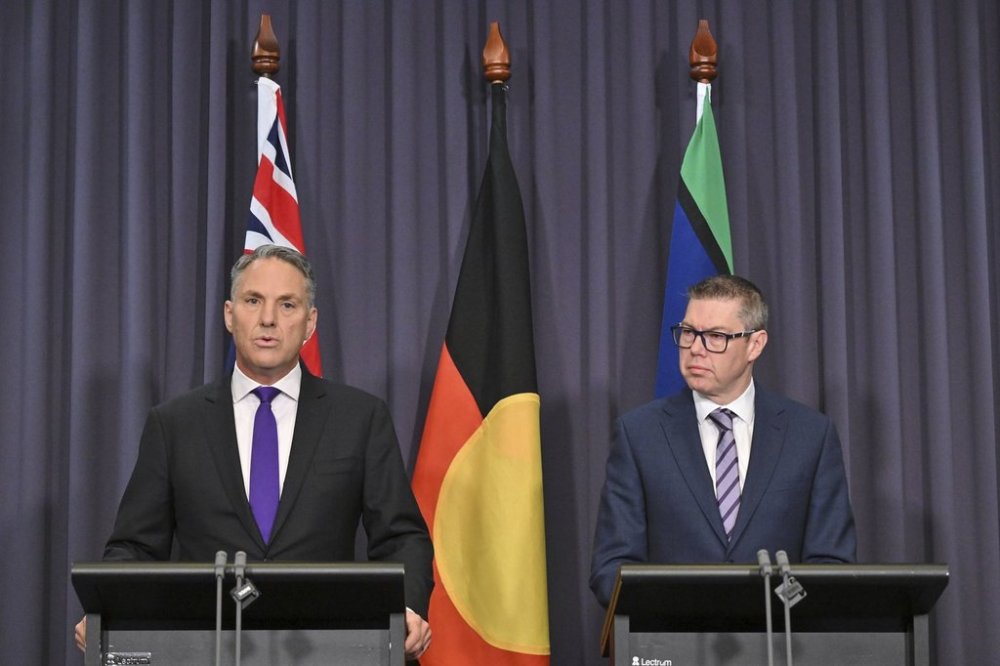 Australia's Deputy Prime Minister Richard Marles, left, and Minister for Defence Industry Pat Conroy address a press conference at Parliament House in Canberra, Australia, Tuesday, August 5, 2025. (Mick Tsikas/AAP Image via AP)