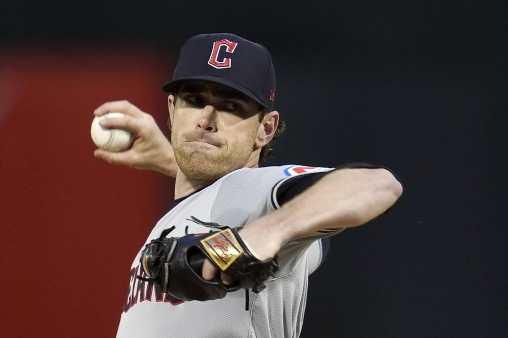 FILE - Cleveland Guardians pitcher Shane Bieber throws to an Oakland Athletics batter during the first inning of a baseball game, Thursday, March 28, 2024, in Oakland, Calif. (AP Photo/Godofredo A. Vásquez, File)