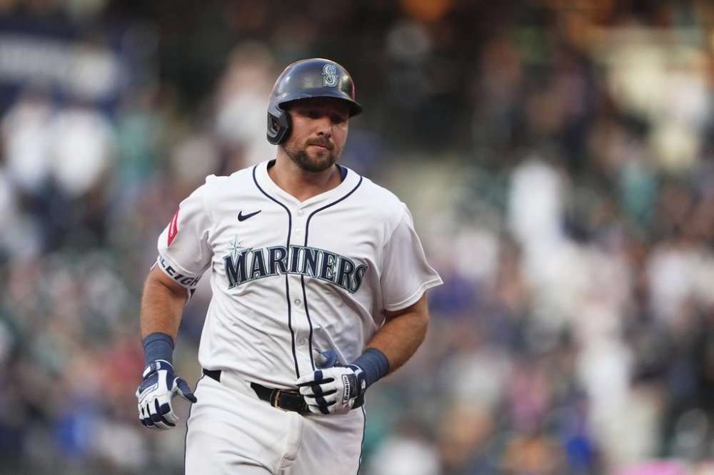Seattle Mariners' Cal Raleigh jogs the bases after hitting a solo home run against the Milwaukee Brewers during the sixth inning of a baseball game Tuesday, July 22, 2025, in Seattle. (AP Photo/Lindsey Wasson)