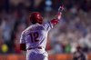 Philadelphia Phillies' Kyle Schwarber reacts to hitting a grand slam home run during the sixth inning of a baseball game against the Baltimore Orioles, Monday, Aug. 4, 2025, in Philadelphia. (AP Photo/Chris Szagola)