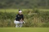 Miyu Yamashita of Japan competes during the second round of the Women's British Open golf championship, at Royal Porthcawl Golf Club in Porthcawl, Wales, Friday, Aug. 1, 2025. (AP Photo/Kin Cheung)