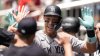 New York Yankees' Aaron Judge (99) celebrates his solo home run against the Atlanta Braves in the first inning of a baseball game, Sunday, July 20, 2025, in Atlanta. (AP Photo/Mike Stewart)