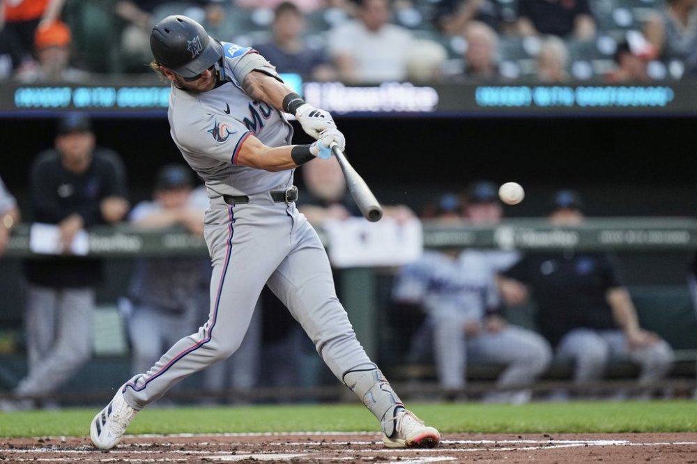 Miami Marlins' Connor Norby hits a single during the third inning of a baseball game against the Baltimore Orioles, Friday, July 11, 2025, in Baltimore. (AP Photo/Stephanie Scarbrough)