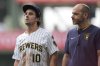 Milwaukee Brewers' Sal Frelick (10) walks to the dugout after suffering an injury during the third inning of a baseball game against the Washington Nationals, Sunday, July 13, 2025, in Milwaukee. (AP Photo/Aaron Gash)