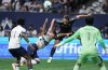 San Diego FC's Ian Pilcher, back right, pulls down Vancouver Whitecaps' Tate Johnson, back left, as they vie for the ball during the first half of an MLS soccer match, in Vancouver, on Wednesday, June 25, 2025. THE CANADIAN PRESS/Darryl Dyck