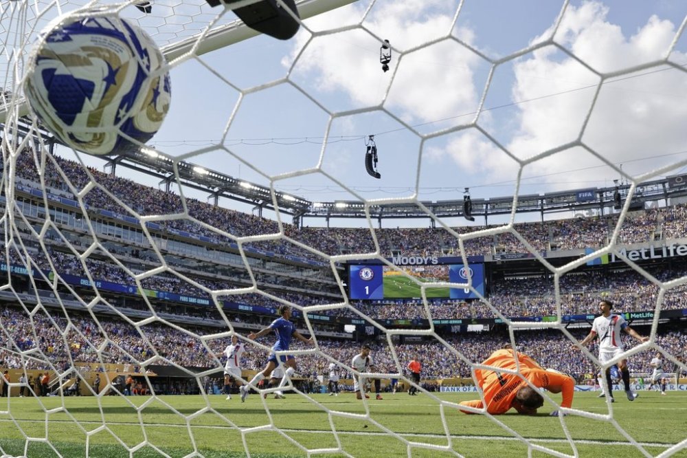 Paris Saint-Germain's goalkeeper Gianluigi Donnarumma can't make the save on the second goal scored by Chelsea's Cole Palmer during the Club World Cup final soccer match between Chelsea and PSG in East Rutherford, N.J., Sunday, July 13, 2025. (AP Photo/Adam Hunger)