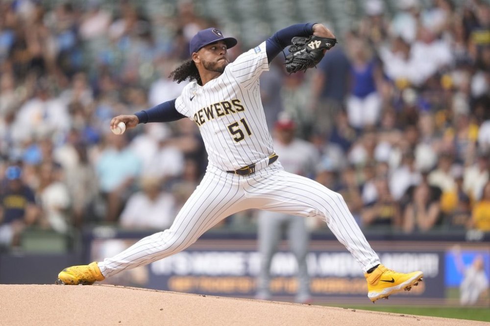 Milwaukee Brewers' Freddy Peralta pitches during the first inning of a baseball game against the Washington Nationals, Sunday, July 13, 2025, in Milwaukee. (AP Photo/Aaron Gash)