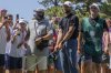 Stephen Curry hits from the spectator area on the 18th hole during the first round of the American Century celebrity golf tournament at Edgewood Tahoe Golf Course in Stateline, Nevada, on Friday, July 11, 2025. His caddie Jason Richards, right, is seen next to him. (Santiago Mejia/San Francisco Chronicle via AP)