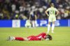 Italy's goalkeeper Laura Giuliani reacts after after losing to England in the Women's Euro 2025 semifinals soccer match between England and Italy at Stade de Geneve in Geneva, Switzerland, Tuesday, July 22, 2025. (Jean-Christophe Bott/Keystone via AP)