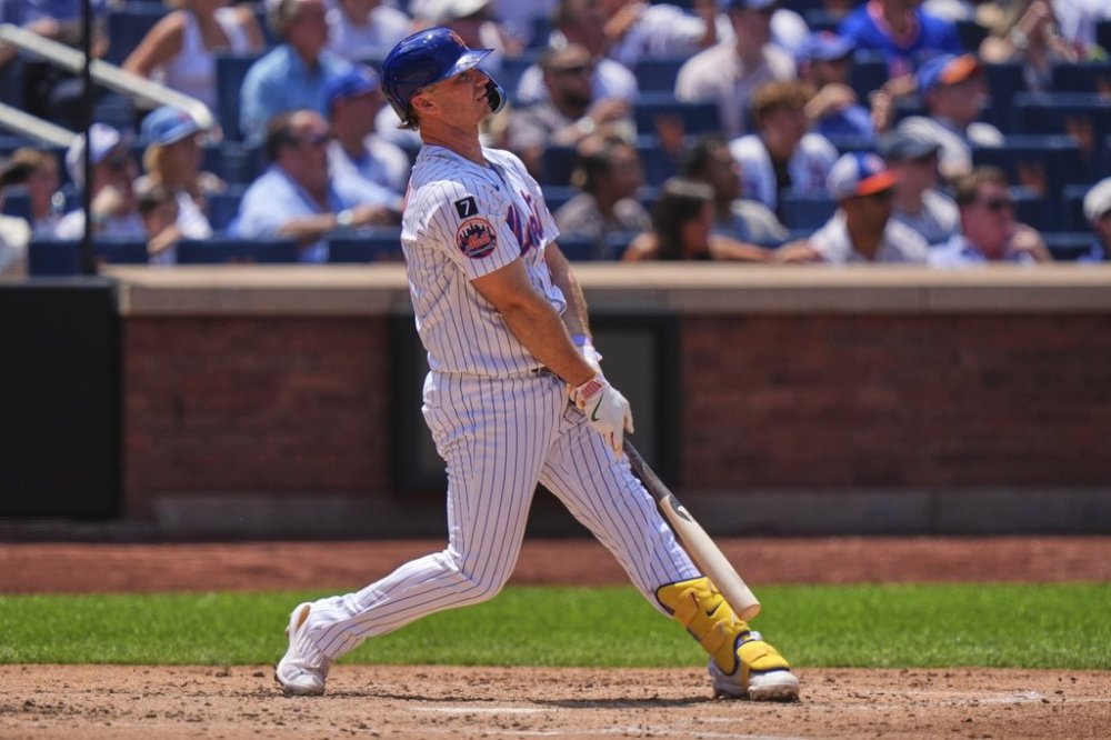 New York Mets' Pete Alonso watches a ball he hit for a three-run home run during the third inning of a baseball game against the Los Angeles Angels Wednesday, July 23, 2025, in New York. (AP Photo/Frank Franklin II)