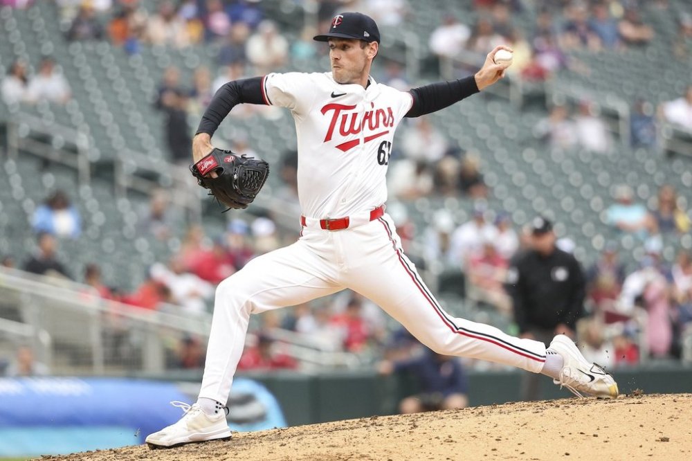 Minnesota Twins relief pitcher Joey Wentz throws during the sixth inning of baseball game against the Texas Rangers, Thursday, June 12, 2025, in Minneapolis. (AP Photo/Matt Krohn)
