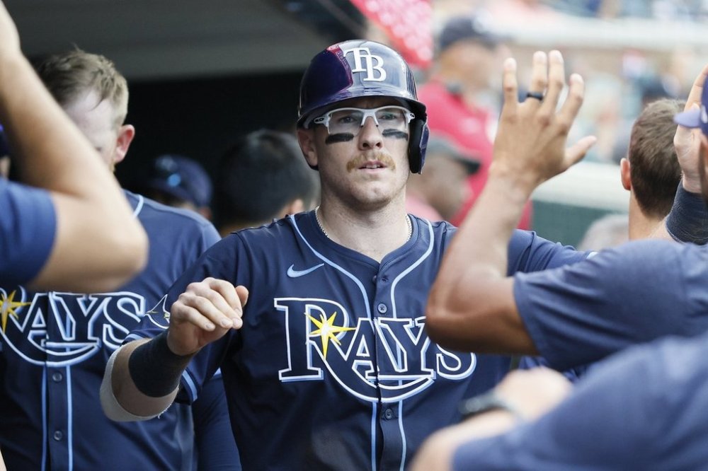 Tampa Bay Rays' Danny Jansen celebrates after scoring against the Detroit Tigers during the sixth inning of a baseball game Wednesday, July 9, 2025, in Detroit. (AP Photo/Duane Burleson)