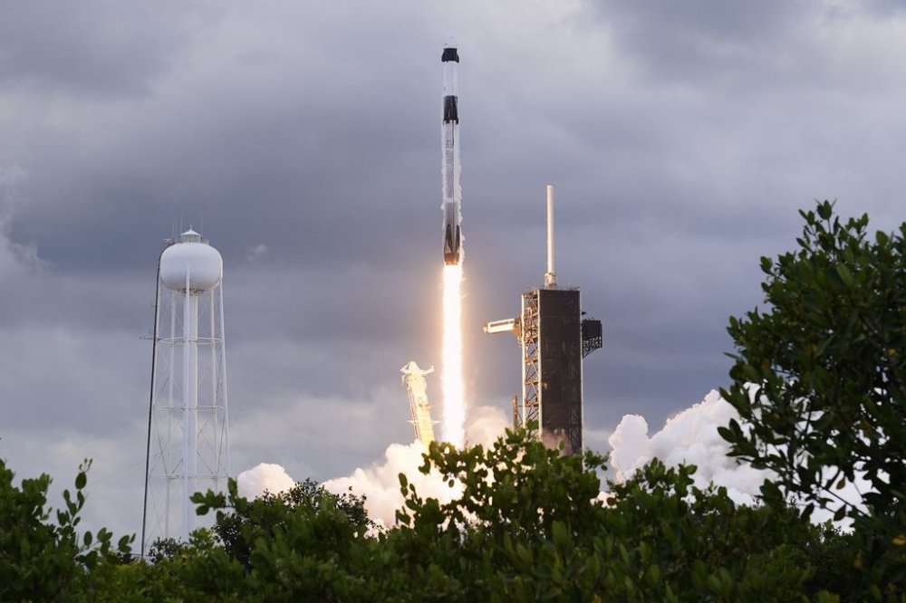 A SpaceX Falcon 9 rocket with a Crew Dragon capsule lifts off from Pad 39-A at the Kennedy Space Center, Friday, Aug. 1, 2025, in Cape Canaveral, Fla. (AP Photo/John Raoux)