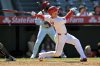Los Angeles Angels' Taylor Ward watches his three-run walkoff home run during the ninth inning of a baseball game against the Chicago White Sox, Sunday, Aug. 3, 2025, in Anaheim, Calif. (AP Photo/Jayne Kamin-Oncea)