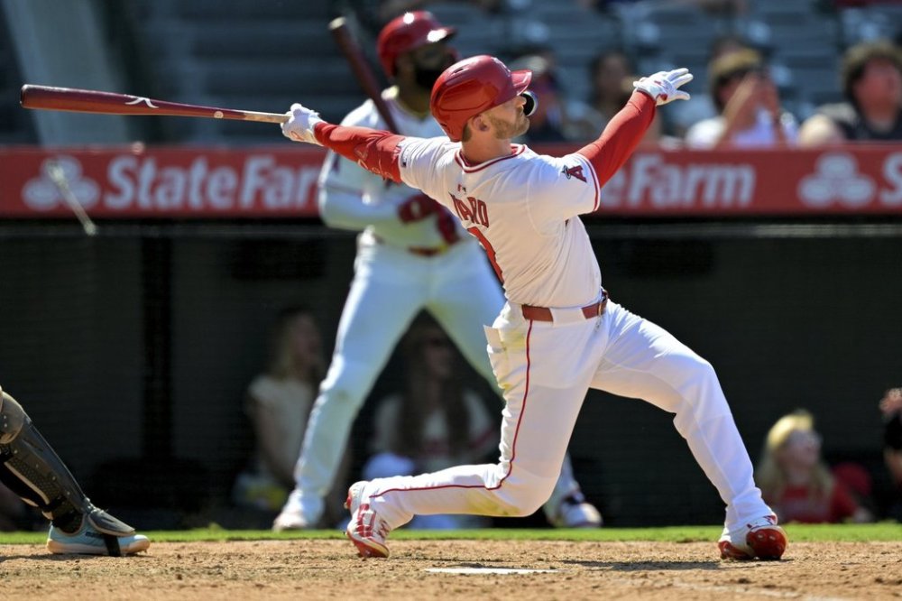 Los Angeles Angels' Taylor Ward watches his three-run walkoff home run during the ninth inning of a baseball game against the Chicago White Sox, Sunday, Aug. 3, 2025, in Anaheim, Calif. (AP Photo/Jayne Kamin-Oncea)