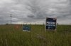 A campaign sign for Independent candidate Bonnie Critchley next to signs for Pierre Poilievre and Darcy Spady in the riding of Battle River-Crowfoot in Camrose, Alta., on Tuesday, July 22, 2025. THE CANADIAN PRESS/Amber Bracken