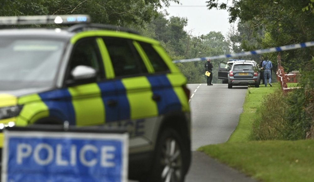The scene in the Drummeer Road area of Maguiresbridge, Northern Ireland, Wednesday, July 23, 2025, after a shooting incident. (Oliver McVeigh/PA via AP)