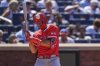 Los Angeles Angels' Chris Taylor is hit by a pitch during the ninth inning of a baseball game against the New York Mets Wednesday, July 23, 2025, in New York. (AP Photo/Frank Franklin II)