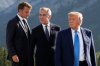 FILE - From left, French President Emmanuel Macron, Canadian Prime Minister Mark Carney and President Donald Trump arrive for the family photograph during the G7 Summit in Kananaskis, Alberta, June 16, 2025. (Adrian Wyld/The Canadian Press via AP, File)