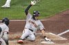 San Francisco Giants' Jung Hoo Lee scores the second of two runs on a single by Patrick Bailey singles off Pittsburgh Pirates pitcher Braxton Ashcraft during the sixth inning of a baseball game in Pittsburgh, Tuesday, Aug. 5, 2025. (AP Photo/Gene J. Puskar)