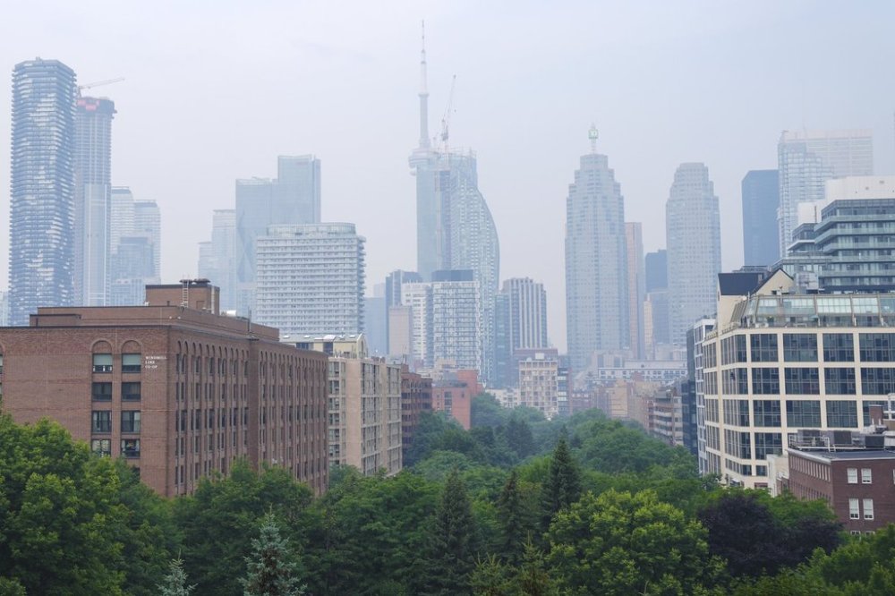 A city view of Toronto on Monday July 14, 2025. An air quality warning has been issued for Toronto, as forest fire smoke pushes levels to