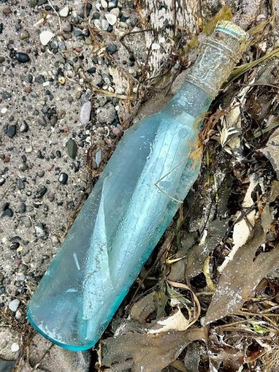 A bottle containing a note from a Newfoundland couple is shown on a beach in southwestern Ireland on July 7, 2025. THE CANADIAN PRESS/Handout - Kate Gay (Mandatory Credit)