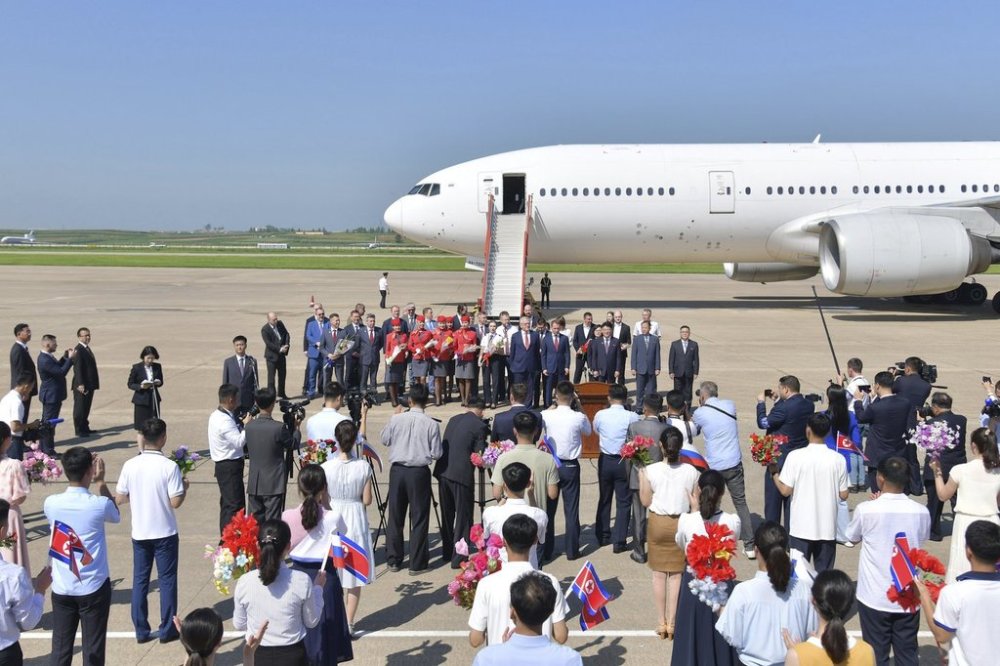 This photo provided on Tuesday, July 29, 2025, by the North Korean government, Alexandr Kozlov, minister of Natural Resources and Ecology, and his delegation attend a ceremony for a direct air route between Moscow and Pyogyang, at the Pyongyang International Airport in Pyongyang, North Korea, on Monday, July 28, 2025. Independent journalists were not given access to cover the event depicted in this image distributed by the North Korean government. The content of this image is as provided and cannot be independently verified. Korean language watermark on image as provided by source reads:
