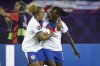 England's Michelle Agyemang, right, celebrates with Lauren James after scoring their second goal during the Women's Euro 2025 quarterfinals soccer match between Sweden and England at Stadion Letzigrund in Zurich, Switzerland, Thursday, July 17, 2025. (Michael Buholzer/Keystone via AP)
