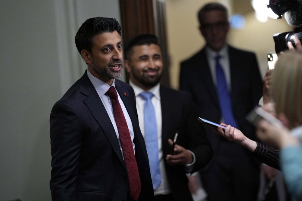 Minister of International Trade Maninder Sidhu speaks to journalists as he arrives for a meeting of the federal cabinet in West Block on Parliament Hill in Ottawa on Wednesday, May 14, 2025. THE CANADIAN PRESS/Justin Tang