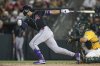 Arizona Diamondbacks' Lourdes Gurriel Jr. hits a single that scores a two runs during the fifth inning of a baseball game against the Athletics, Saturday, Aug. 2, 2025, in West Sacramento, Calif. (AP Photo/Scott Marshall)
