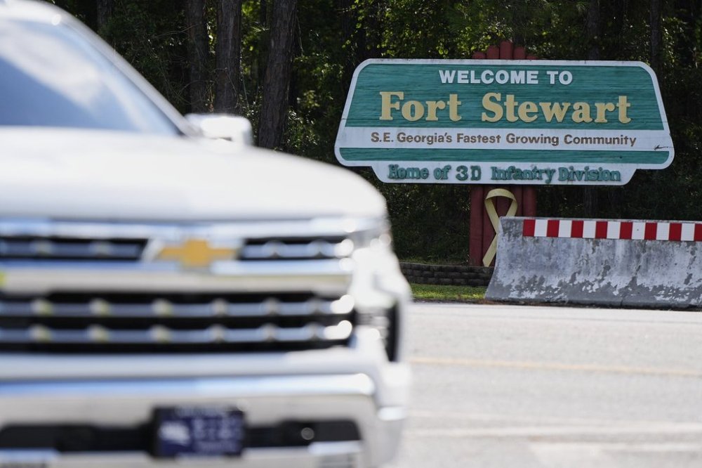 A sign welcoming people to Fort Stewart in Georgia is seen on Wednesday, Aug. 6, 2025. (AP Photo/Mike Stewart)