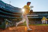 Boston Red Sox's Roman Anthony takes the field in the seventh inning of a baseball game against the Houston Astros, Saturday, Aug. 2, 2025, in Boston. (AP Photo/Greg M. Cooper)