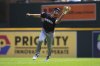 Minnesota Twins right fielder Matt Wallner catches a Detroit Tigers' Matt Vierling fly ball on the run in the fifth inning during a baseball game Wednesday, Aug. 6, 2025, in Detroit. (AP Photo/Paul Sancya)