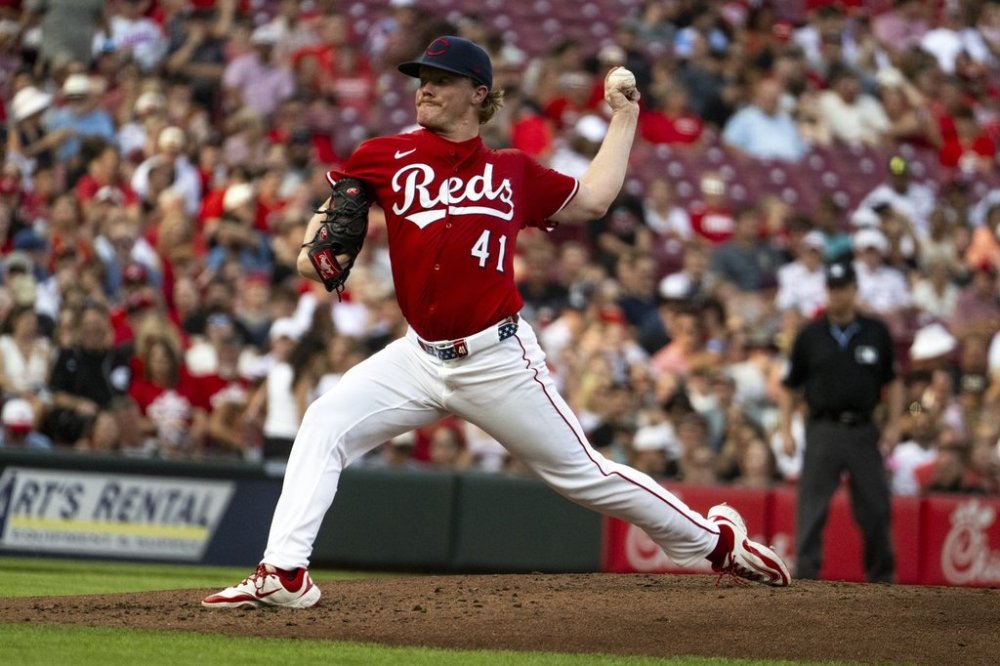 Cincinnati Reds pitcher Andrew Abbott throws during the first inning of a baseball game against the Tampa Bay Rays, Saturday, July 26, 2025, in Cincinnati. (AP Photo/Michael Swensen)