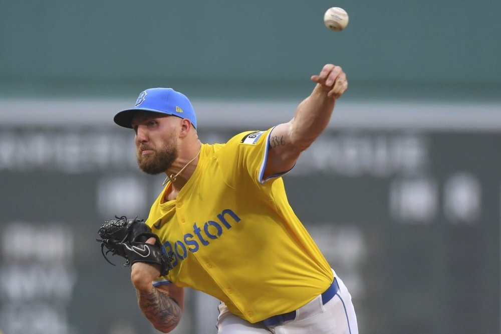 Boston Red Sox's Garrett Crochet delivers a pitch to a Los Angeles Dodgers batter in the first inning of a baseball game, Saturday, July 26, 2025, in Boston. (AP Photo/Steven Senne)
