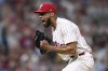 Philadelphia Phillies pitcher Cristopher Sánchez reacts after striking out Boston Red Sox's Rob Refsnyder during the eighth inning of a baseball game Tuesday, July 22, 2025, in Philadelphia. (AP Photo/Matt Slocum)