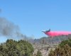 This photo provided by the Bureau of Land Management shows aerial resources working to suppress White Sage wildfire burning north of Grand Canyon National Park in Ariz., on Thursday, July 10, 2025. (Bureau of Land Management, Arizona State Office via AP)