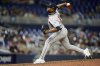 Houston Astros closing pitcher Hector Neris pitches in the ninth inning of a baseball game against the Miami Marlins, Monday, Aug. 4, 2025, in Miami. (AP Photo/Rebecca Blackwell)