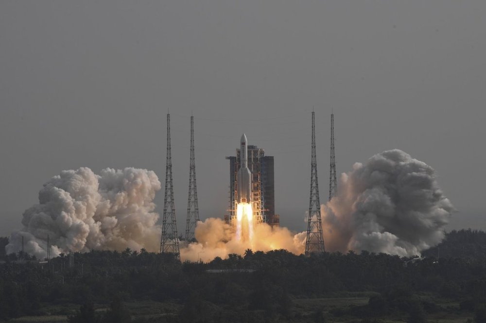 FILE - In this photo released by Xinhua News Agency, the Long March-5B Y4 carrier rocket carrying the space lab module Mengtian blasts off from the Wenchang Satellite Launch Center in south China's Hainan Province on Oct. 31, 2022. (Hu Zhixuan/Xinhua via AP, File)