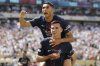 Paris Saint-Germain's Fabian Ruiz, bottom, celebrates with team mate Achraf Hakimi after scoring his side's third goal during the Club World Cup semifinal soccer match between PSG and Real Madrid in East Rutherford, N.J., Wednesday, July 9, 2025. (AP Photo/Adam Hunger)